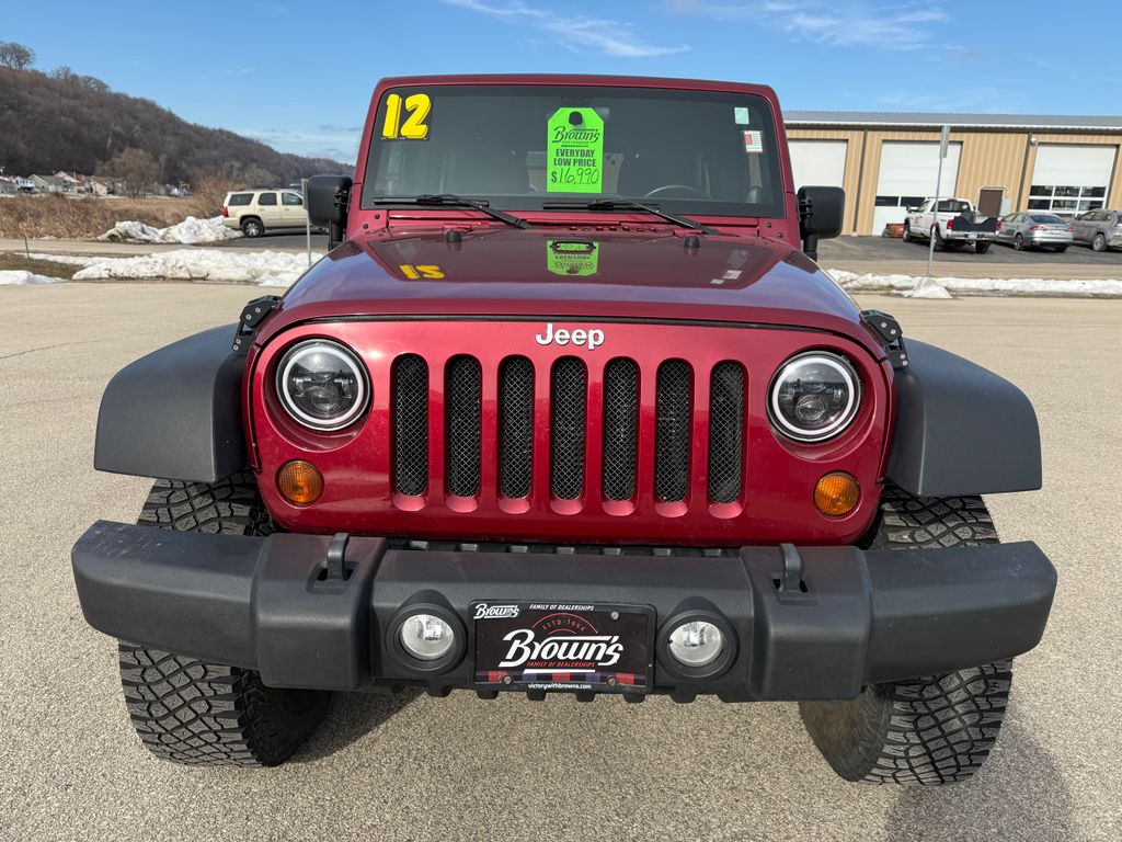 Used 2012 Jeep Wrangler Unlimited Sport with VIN 1C4BJWDG6CL201193 for sale in Guttenberg, IA