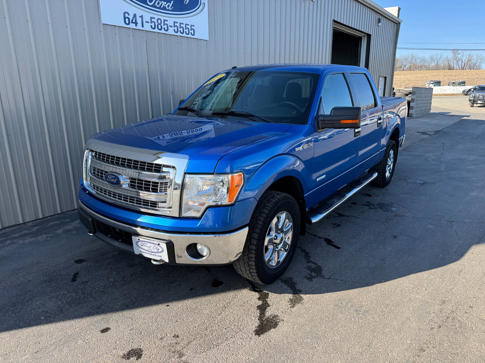 Used 2014 Ford F-150 XLT with VIN 1FTFW1ET0EKF77981 for sale in Forest City, IA