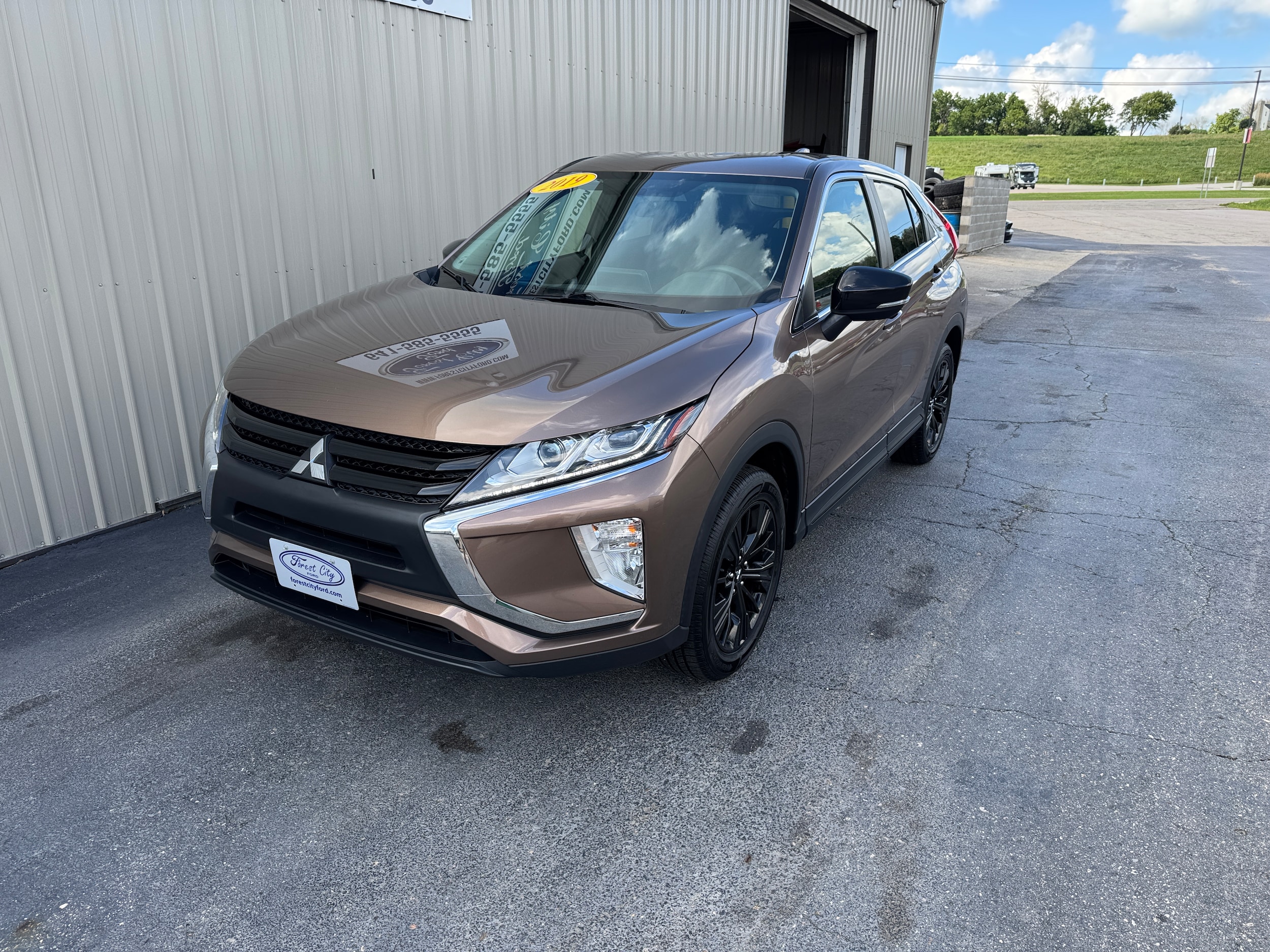 Used 2019 Mitsubishi Eclipse Cross LE with VIN JA4AT4AA8KZ008978 for sale in Forest City, IA
