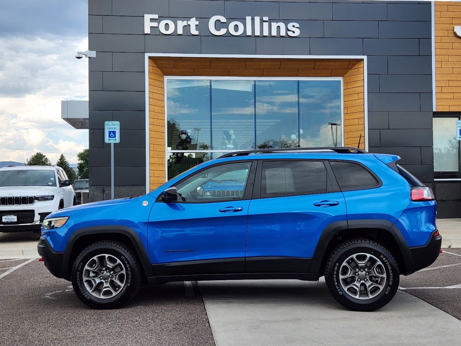 Used 2022 Jeep Cherokee Trailhawk with VIN 1C4PJMBX6ND533015 for sale in Fort Collins, CO