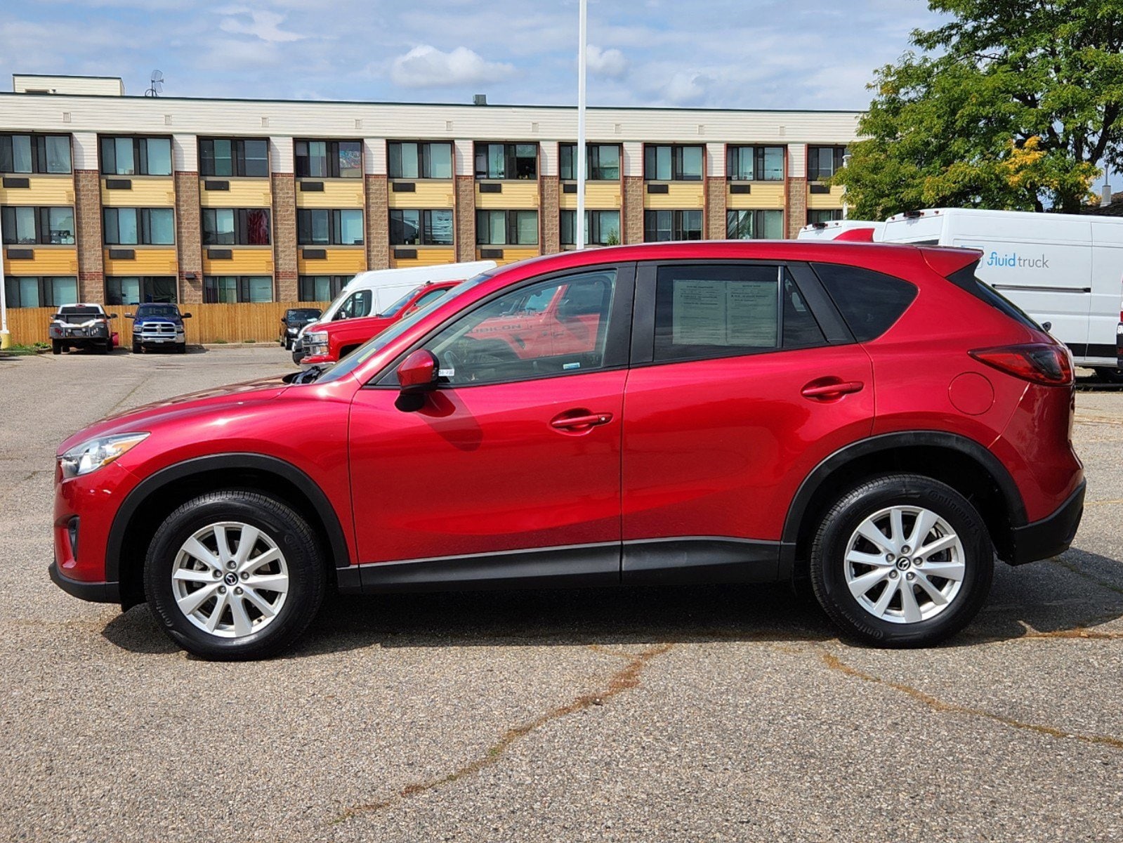 Used 2014 Mazda CX-5 Touring with VIN JM3KE4CY3E0366780 for sale in Fort Collins, CO