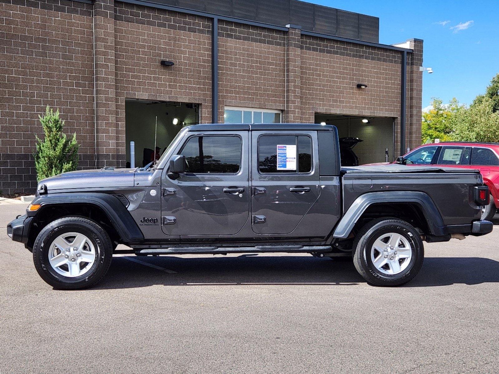 Used 2021 Jeep Gladiator Sport with VIN 1C6JJTAG9ML510907 for sale in Fort Collins, CO