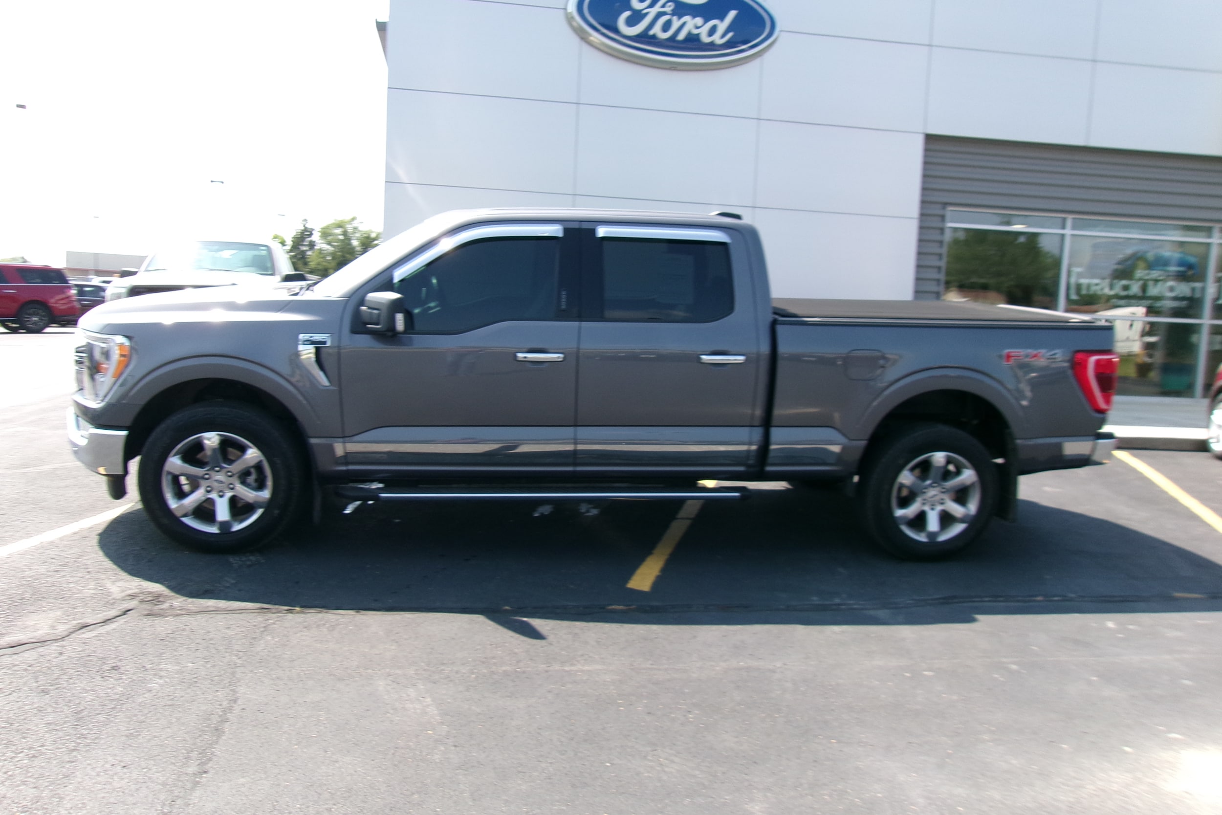 Used 2021 Ford F-150 XLT with VIN 1FTFW1E86MFA41555 for sale in Kansas City