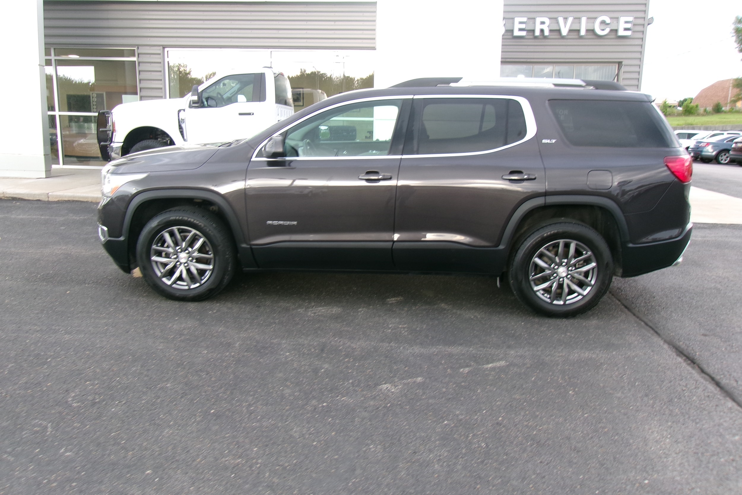 Used 2017 GMC Acadia SLT-1 with VIN 1GKKNULS7HZ242052 for sale in Kansas City