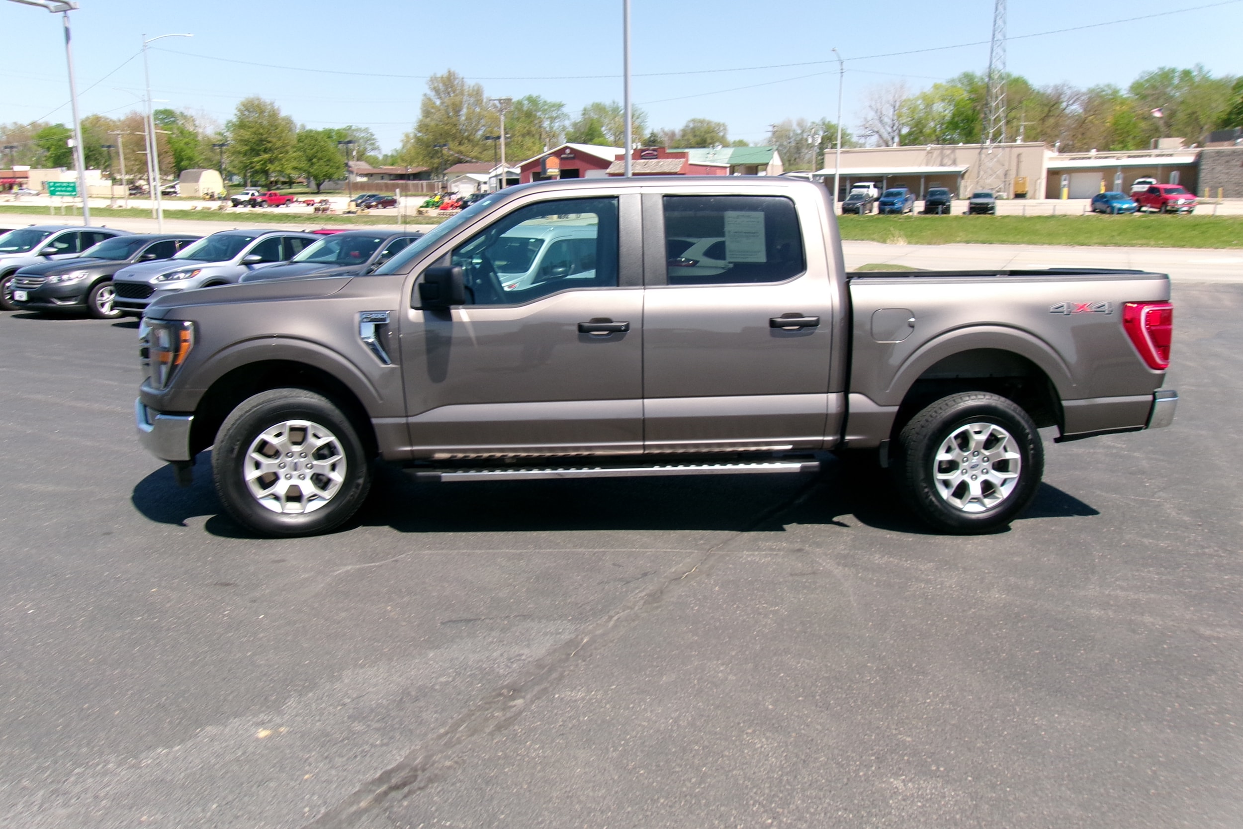 Used 2023 Ford F-150 XLT with VIN 1FTFW1E5XPFB69565 for sale in Kansas City