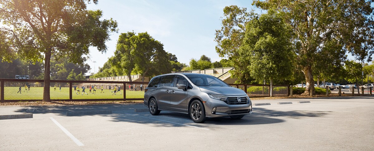 Honda Odyssey Near a Sports Field