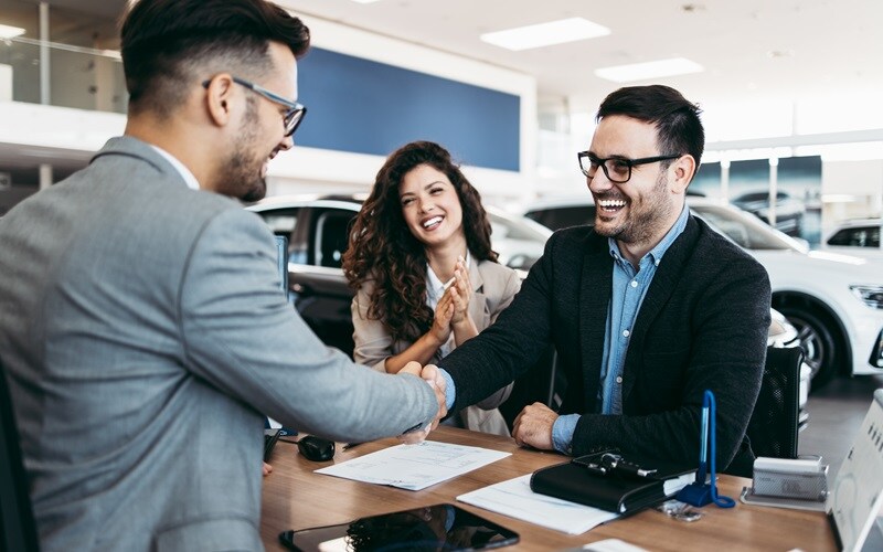 Couple Securing Financing for a New Honda