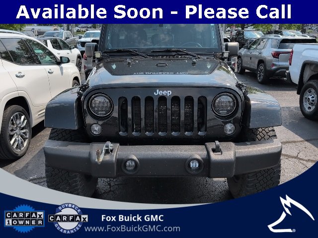 Used 2014 Jeep Wrangler Unlimited Sahara with VIN 1C4BJWEG1EL108745 for sale in Farmington, MI
