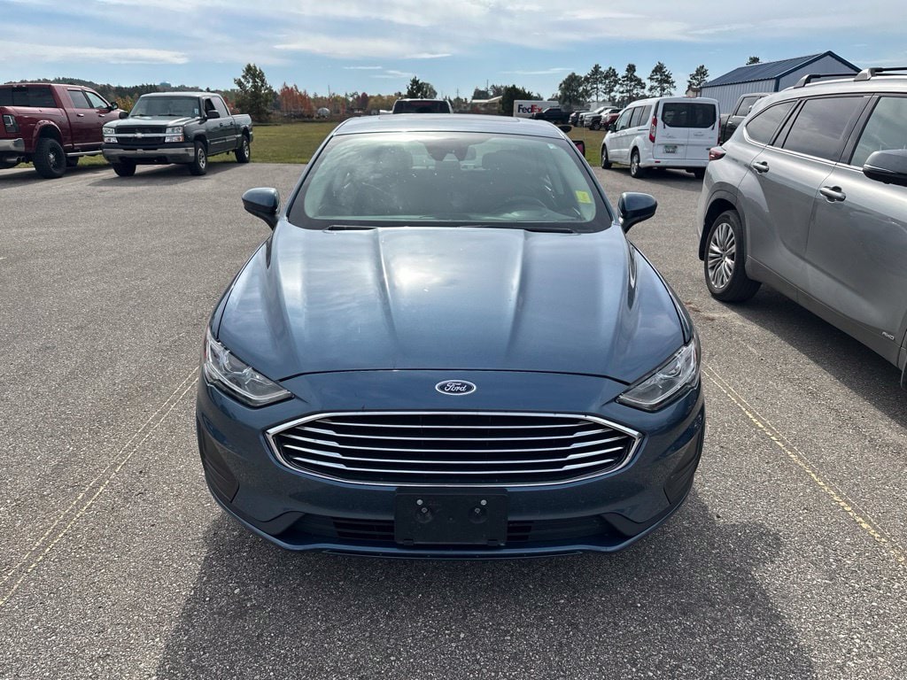 Used 2019 Ford Fusion SE with VIN 3FA6P0HD2KR214882 for sale in Cadillac, MI