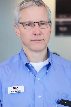 Staff member Tom Peters from 65e7b811ac1f