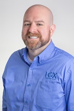 Staff member Jon Riley from 65e7b811ac1f