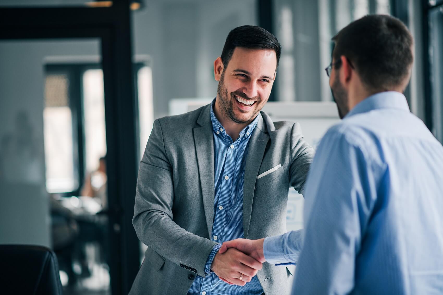 Customer and Sales Representative Completing a Ram Lease Agreement