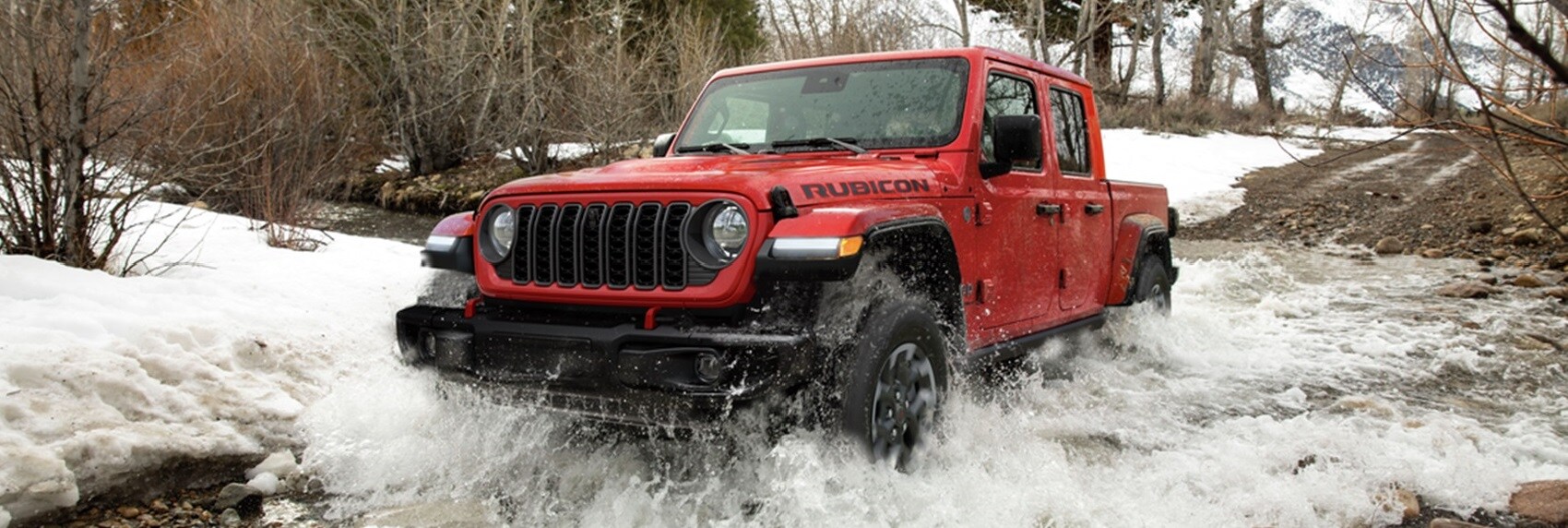 New Jeep Gladiator Going Through an Icy River