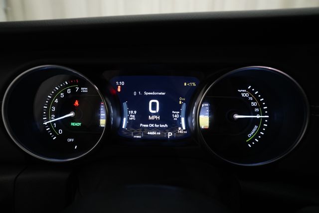 Used 2022 Jeep Wrangler Unlimited Sahara 4XE with VIN 1C4JJXP65NW256742 for sale in Grand Rapids, MI