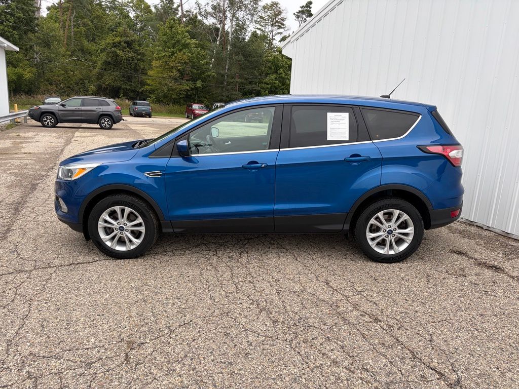 Used 2017 Ford Escape SE with VIN 1FMCU9G99HUD08729 for sale in Reed City, MI