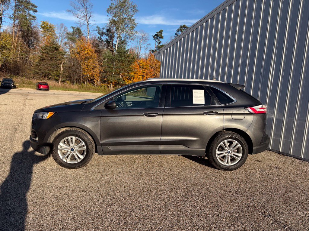Used 2020 Ford Edge SEL with VIN 2FMPK4J90LBB23521 for sale in Reed City, MI