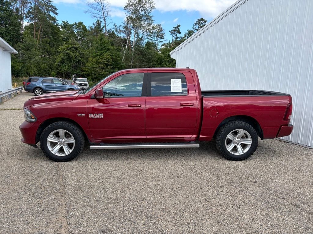 Used 2014 RAM Ram 1500 Sport with VIN 1C6RR7MT9ES261737 for sale in Reed City, MI
