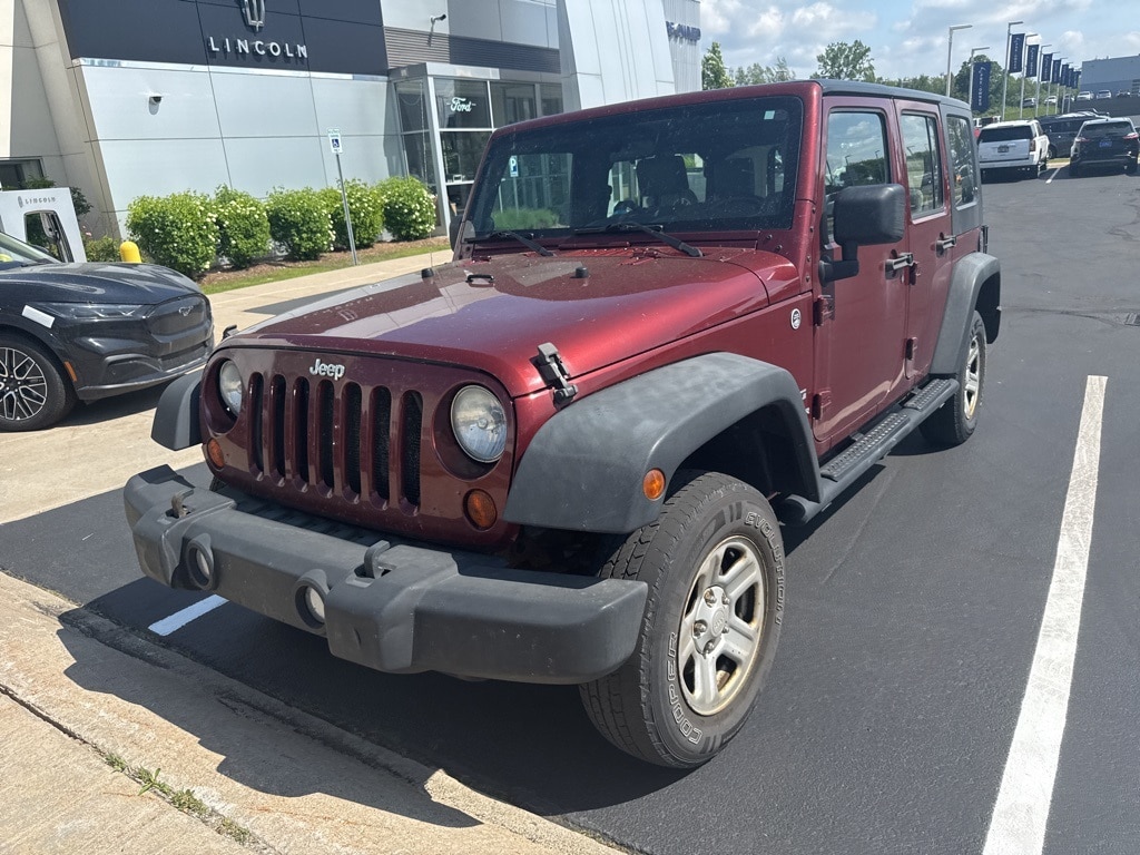 Used 2010 Jeep Wrangler Unlimited Sport with VIN 1J4BA3H11AL174464 for sale in Traverse City, MI