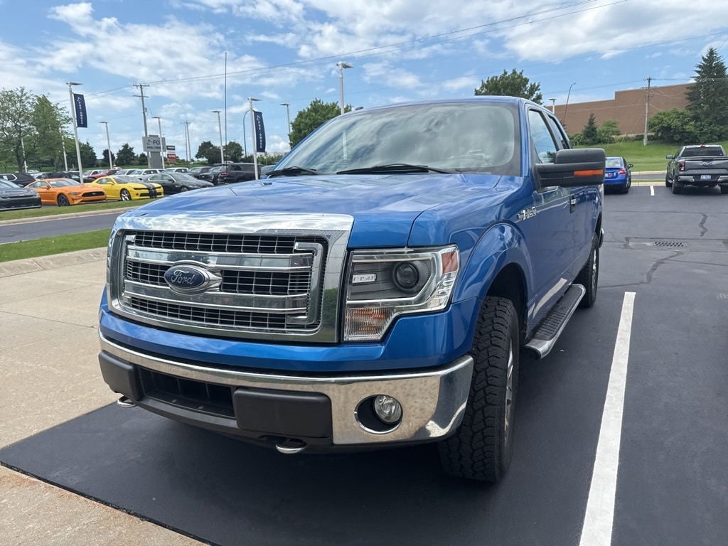 Used 2014 Ford F-150 XLT with VIN 1FTFX1EFXEKG31035 for sale in Traverse City, MI