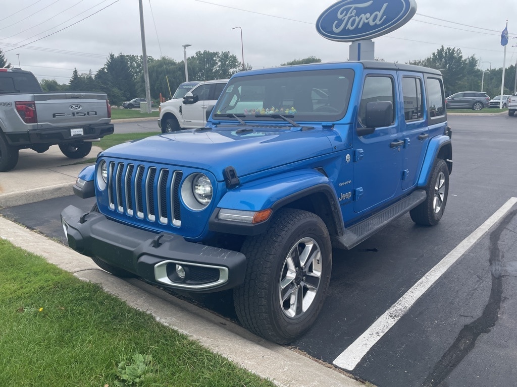 Certified 2022 Jeep Wrangler Unlimited Sahara with VIN 1C4HJXEG6NW219984 for sale in Traverse City, MI