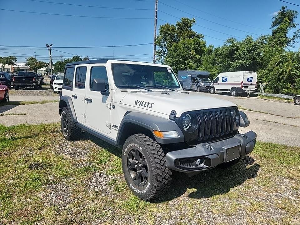 Certified 2021 Jeep Wrangler Unlimited Willys with VIN 1C4HJXDG4MW510046 for sale in Traverse City, MI