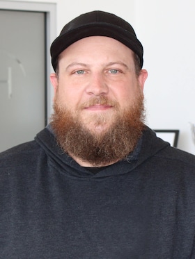 Staff member Andrew Miller from ID_0693d1