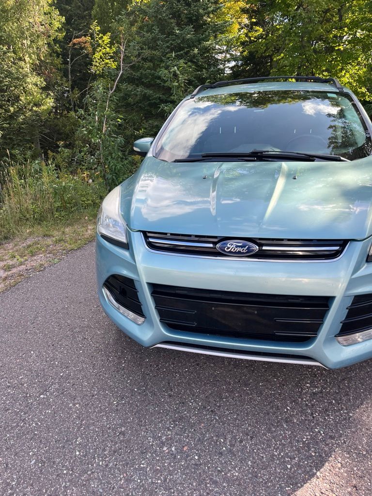Used 2013 Ford Escape SEL with VIN 1FMCU9HX2DUB06760 for sale in Marquette, MI