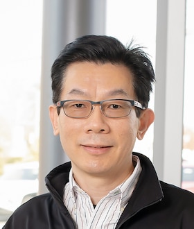 Staff member Jerry Teng from ID_6b3d9e