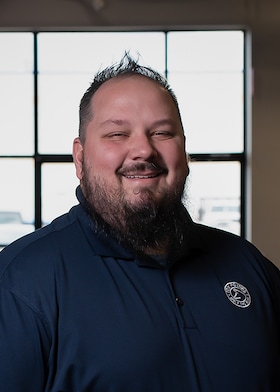 Staff member Thomas Johnson from ID_666863