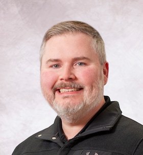 Staff member Christopher Smith from ID_d09e48