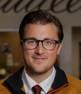 Staff member Andrew Kostoff from ID_3dcd92