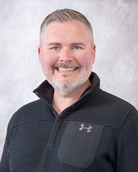 Staff member Christopher Smith from ID_47aacf