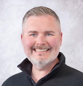 Staff member Christopher Smith from ID_a305c1