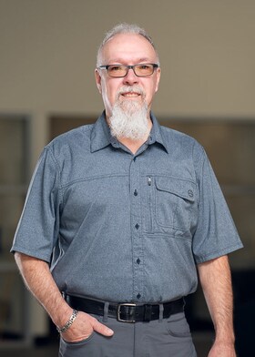 Staff member Ron Hewett from ID_e0117a