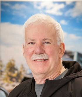 Staff member John Debri from ID_e95386