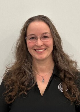 Staff member Maggie Diges from ID_2912df