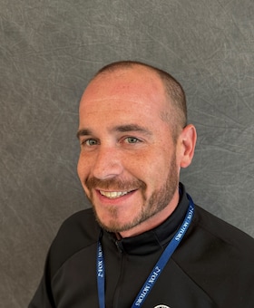 Staff member Christopher Send from ID_a3b486