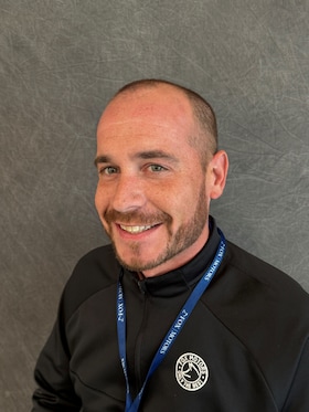 Staff member Christopher Send from ID_d1a3e4