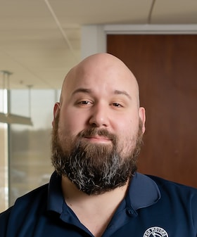 Staff member Eric Coppola from ID_556fd8