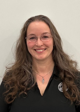 Staff member MAGGIE DIGES from ID_89a9bf