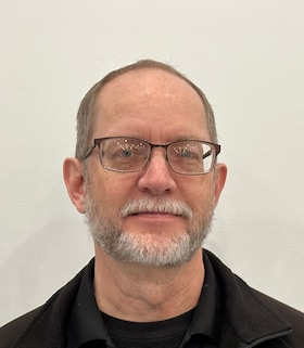 Staff member Gene Uuro from ID_8faaaf