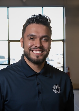 Staff member Oscar Torres from ID_666863