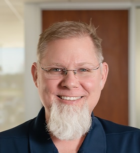 Staff member John Moore from ID_556fd8