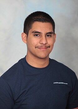 Staff member Orlando Osorio from ID_65797b