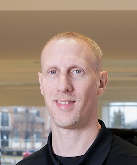 Staff member Tim Price from ID_9576df977801