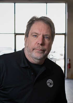 Staff member Tom Gatesy  from ID_0f296e167340