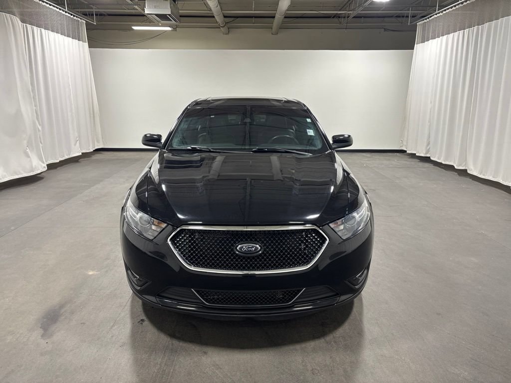 Used 2016 Ford Taurus SHO with VIN 1FAHP2KT1GG141118 for sale in Cadillac, MI