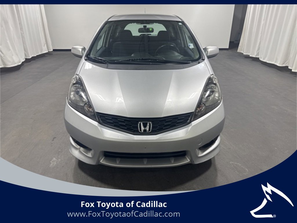 Used 2013 Honda Fit Sport with VIN JHMGE8H56DC004233 for sale in Cadillac, MI