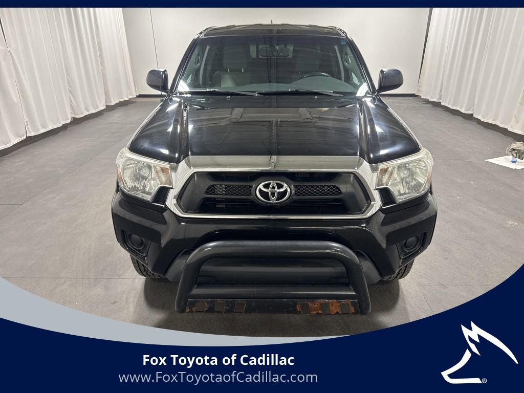 Used 2015 Toyota Tacoma Base with VIN 5TFUU4EN6FX136277 for sale in Cadillac, MI