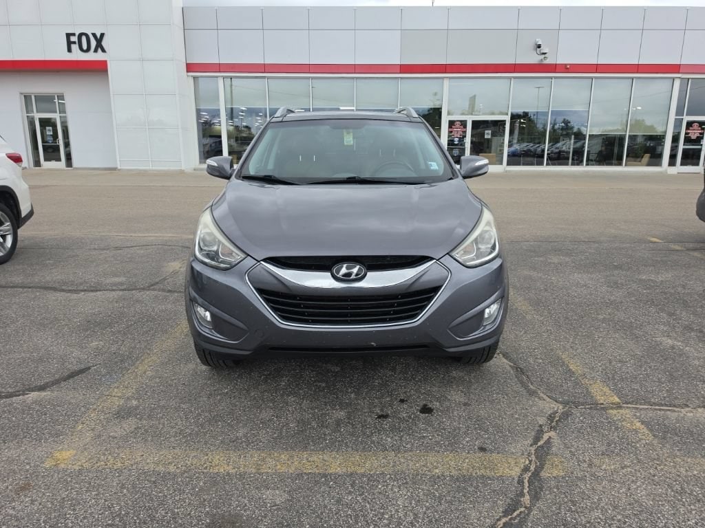 Used 2014 Hyundai Tucson Limited with VIN KM8JUCAG7EU798708 for sale in Cadillac, MI